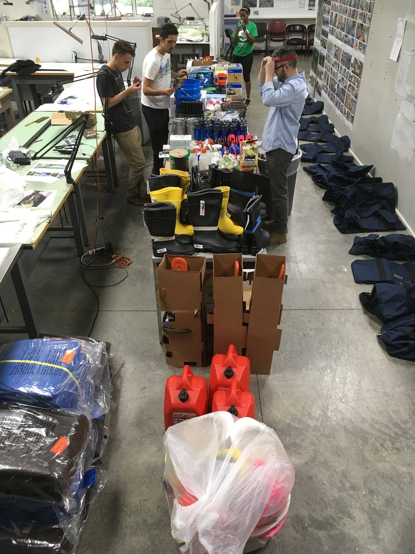 Troy Homenchuk and Andrews University architecture students packing items on Friday, Sept. 29, to assist with relief efforts in Puerto Rico. [Photo: Andrew von Maur, Andrews University News]