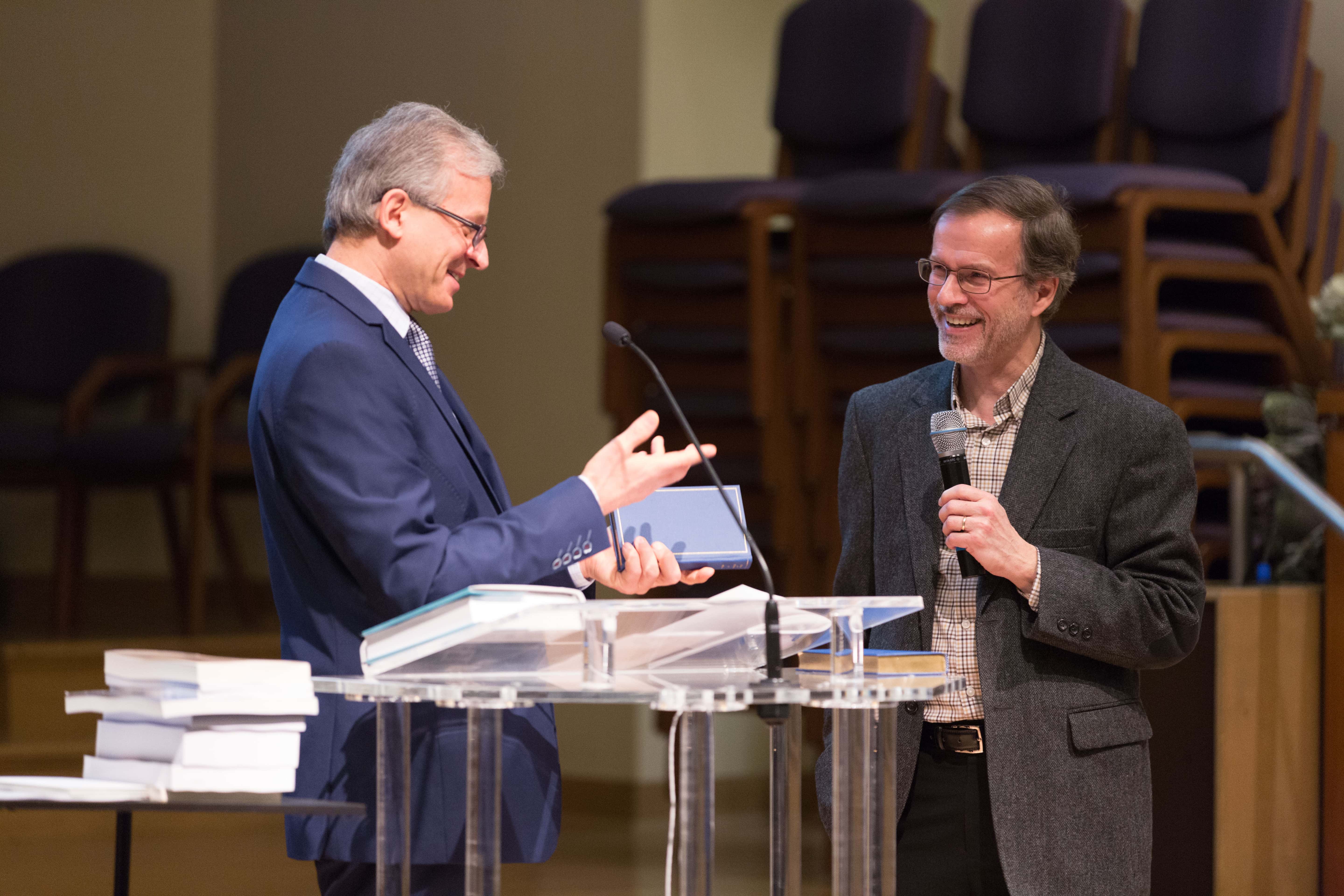 During the dedication of the annotated "Steps to Christ" at the Seventh-day Adventist Theological Seminary, Denis Fortin, who provided an extensive historical introduction and notes for this special edition, was recognized by Jiri Moskala, dean of the Seminary. (Credit: Darren Heslop)