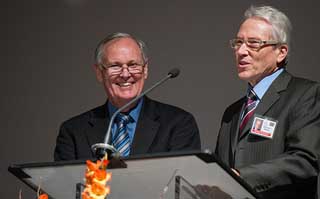 JOINT EFFORTS: Ekkehardt Mueller, right, an associate director of the Biblical Research Institute, and  Jim Gibson, left, director of the Geoscience Research Institute, discuss the two group's joint and individual efforts to promote Creation within the Church. [PHOTO: Ansel Oliver/ANN]