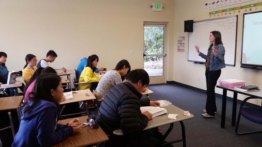 Brendy Lindsay, a teacher at Auburn Adventist Academy, presents a bilingual Bible to any ESL student who asks for one. (Heidi Baumgartner / Gleaner)
