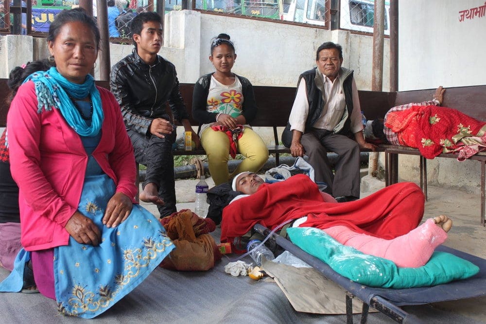 Rami, left, and her son Enos at a district hospital. She says she doesn't know what she will do next. (Mai Ogawa / ADRA)