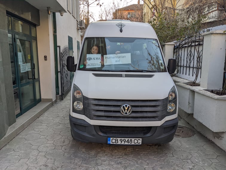 ADRA Van filled with food bags