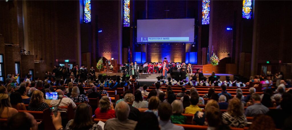 CO Graduation 2022 GraduationCeremony AvondaleUniversityChurch 2212 MV squashed 1024x457 1